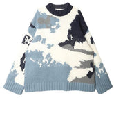 Blauer Himmel und weiße Wolken Lockerer Wollstrickpullover